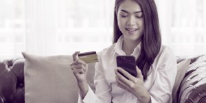 Female consumers shops on mobile for Singles' Day