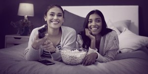 Female consumers watching TV
